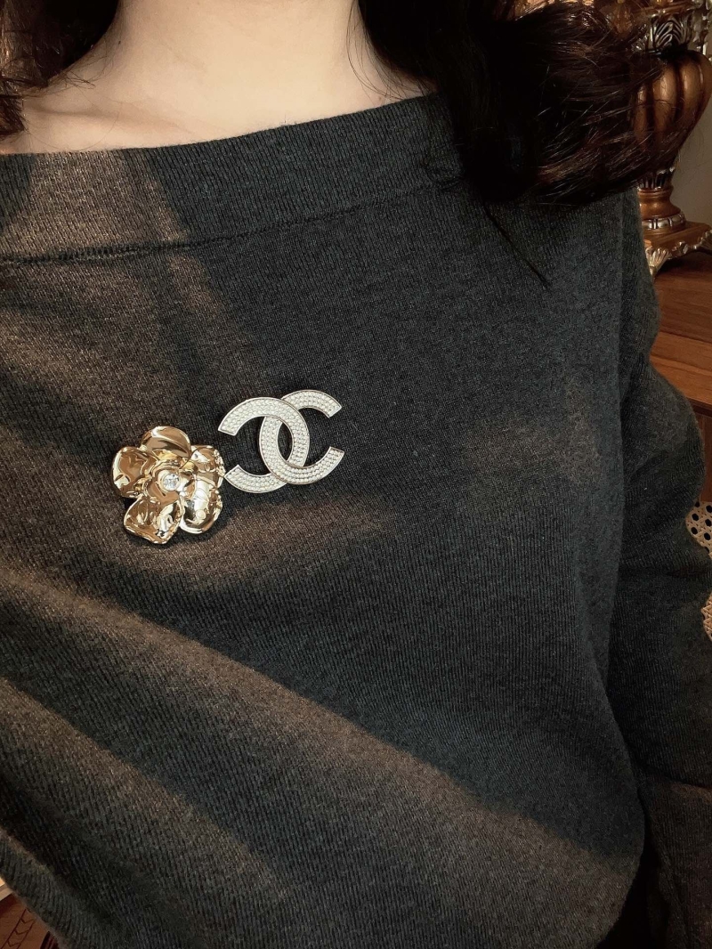 Ch**el brooches